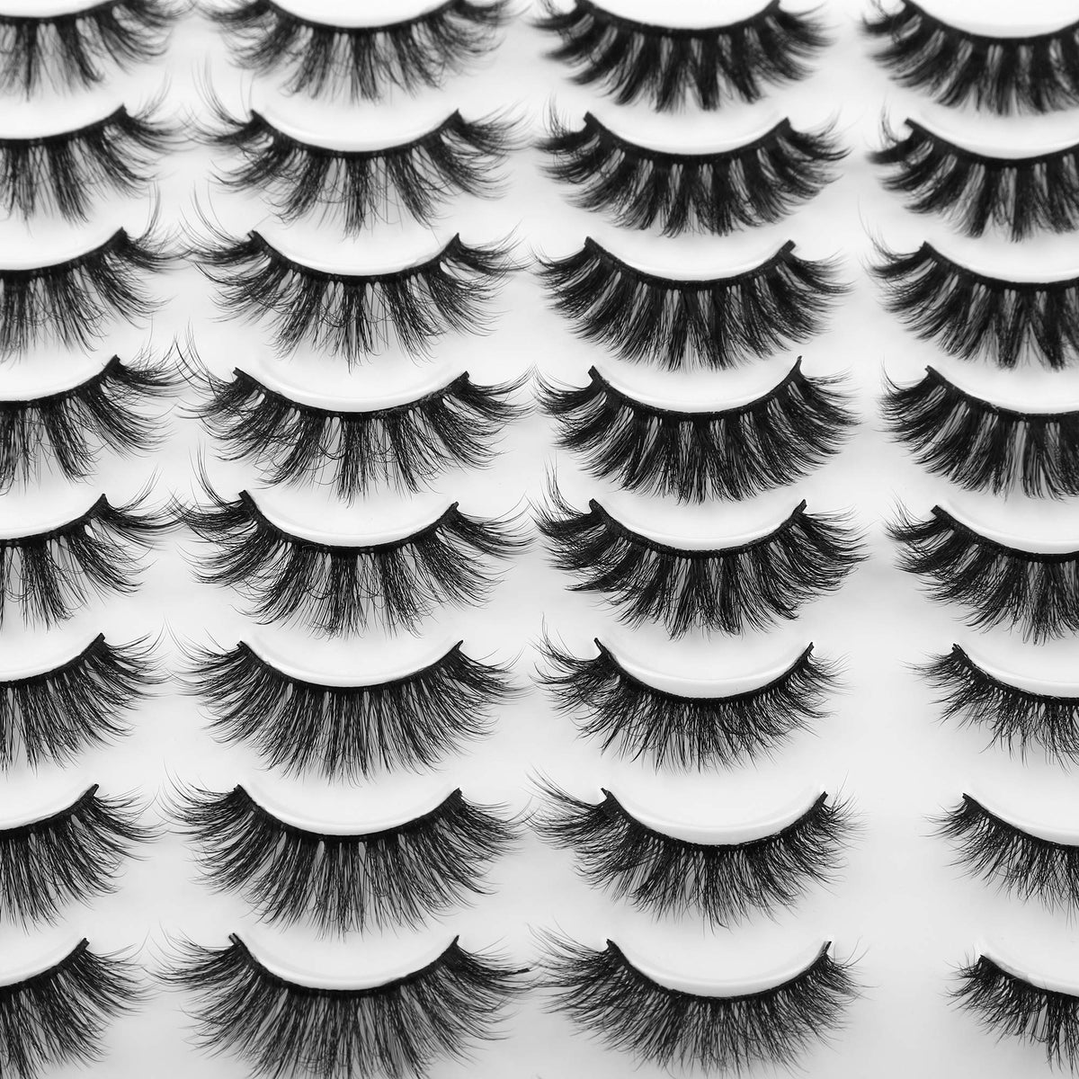 JIMIRE model wearing cat-eye style lashes for dramatic evening effect