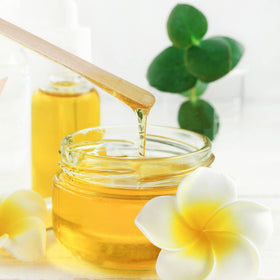 JIUHSHN lifestyle scene applying facial mask with a wax stick for neat results