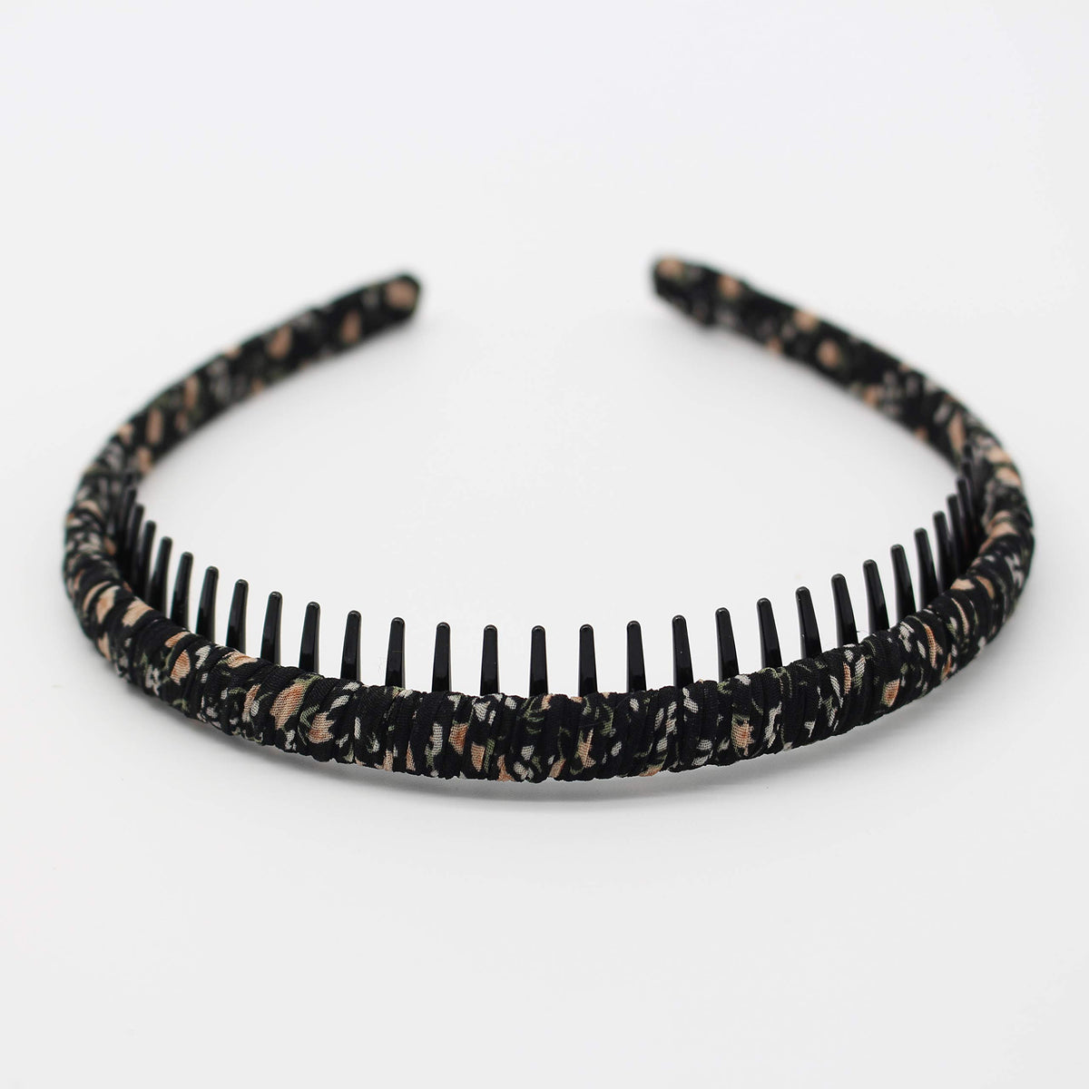 JOBAND headband worn with ponytail demonstrating secure hold and everyday style
