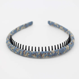 JOBAND headband styled in bedroom setting suggesting gift and lifestyle appeal
