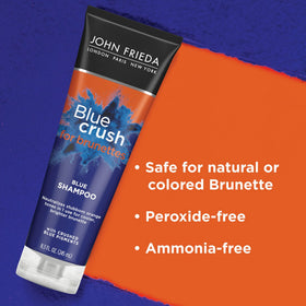 John Frieda Blue Crush crushed blue pigments close-up illustrating tone-correcting action
