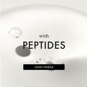 John Frieda demonstrating crown lift after spraying for added height