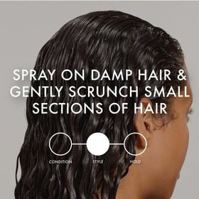 John Frieda close detail of defined curl spiral, enhances shape and shine