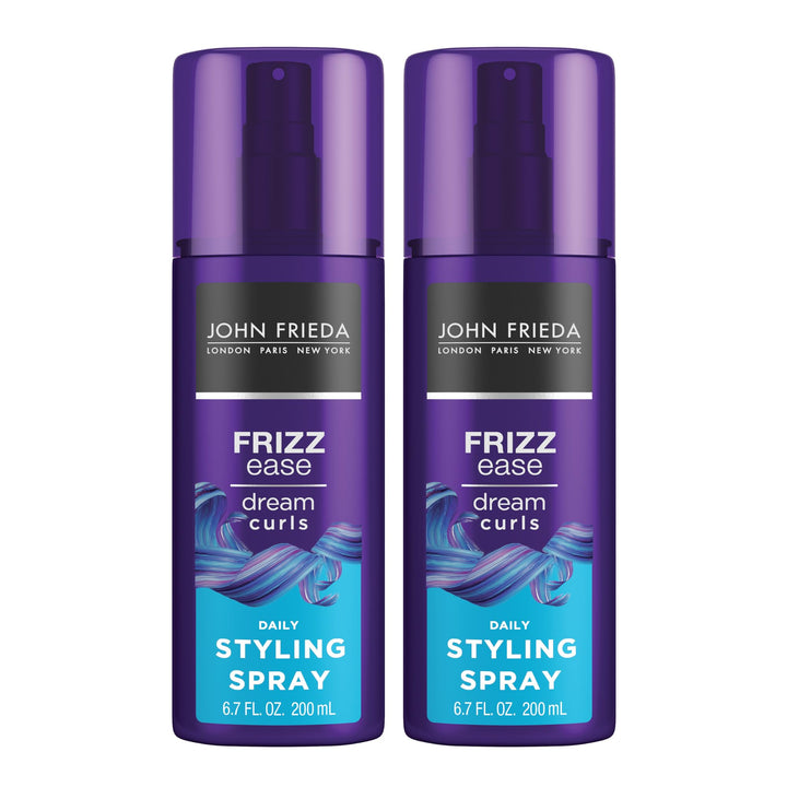 John Frieda front bottle image showing Dream Curls spray and defined curls benefit