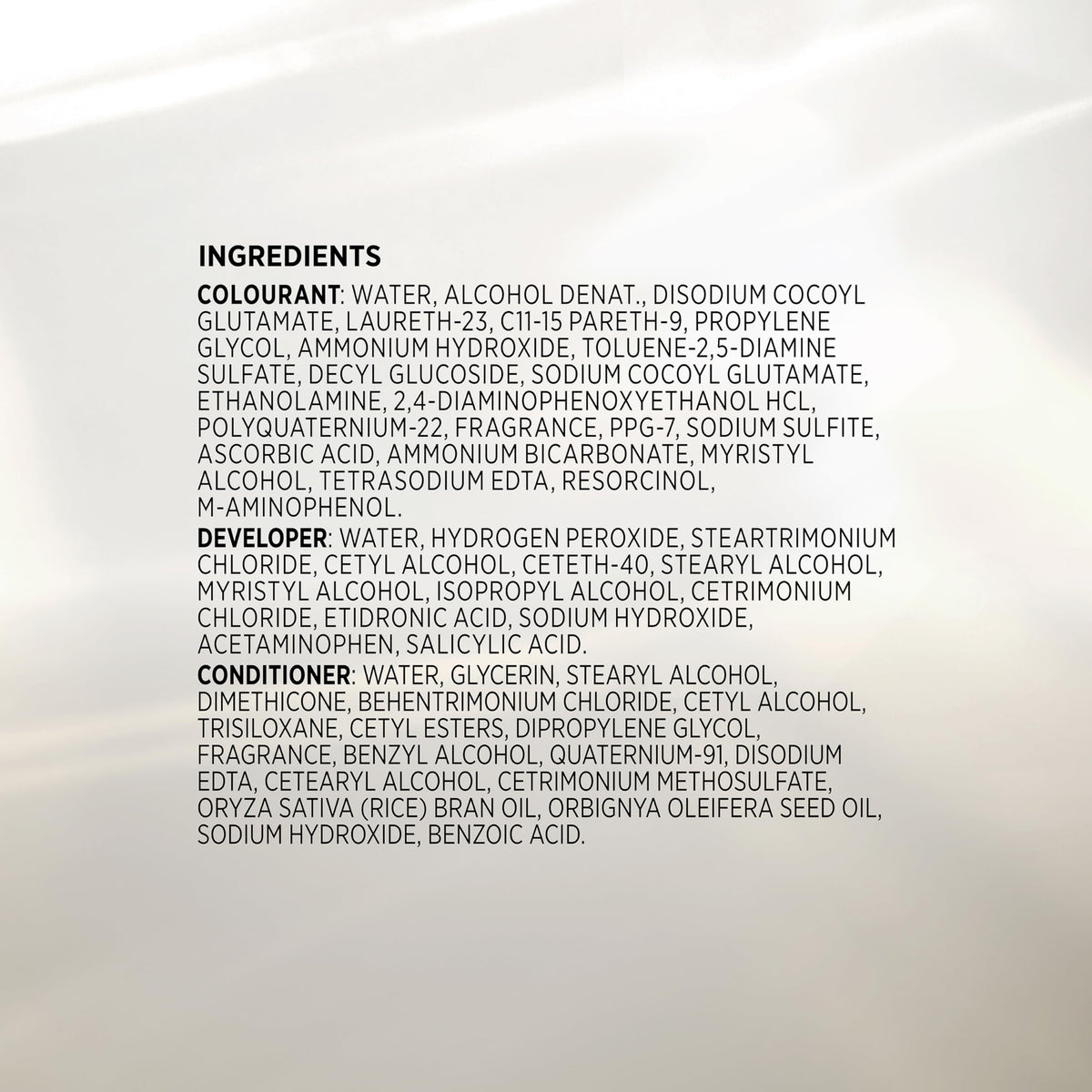 John Frieda label close-up with usage instructions and ingredient highlights