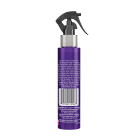 John Frieda modeled sleek glossy hair after styling for frizz control