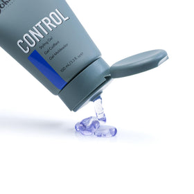 JOHNNY B. control used on short hair demonstrating strong hold and glossy finish