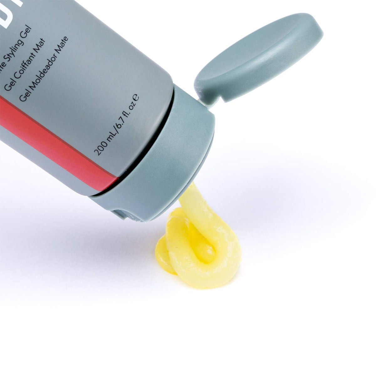 JOHNNY B. jar held in hand showing 6.7 oz size and travel-friendly benefit