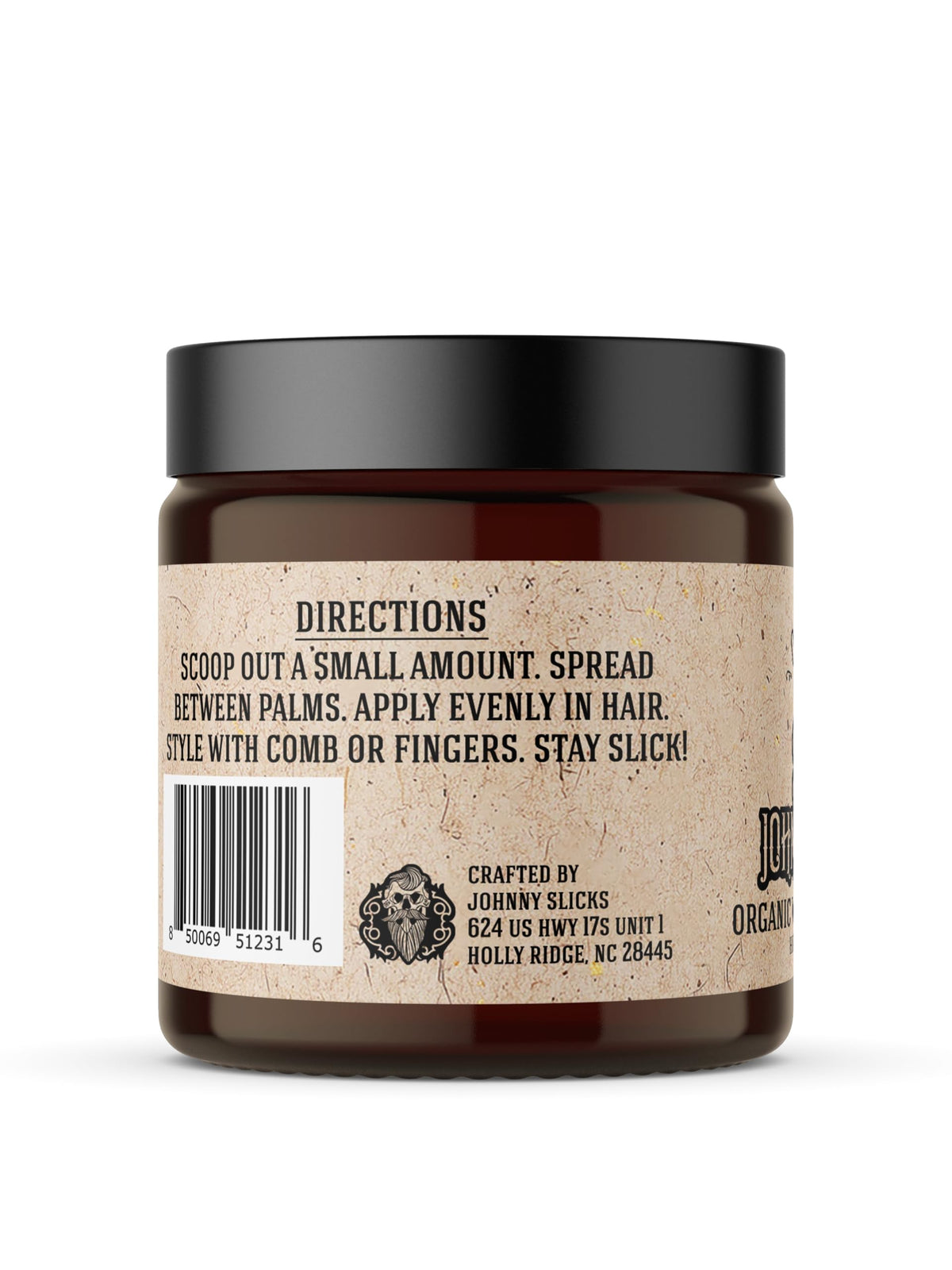 Johnny Slicks pomade in palm ready to apply for easy styling benefit