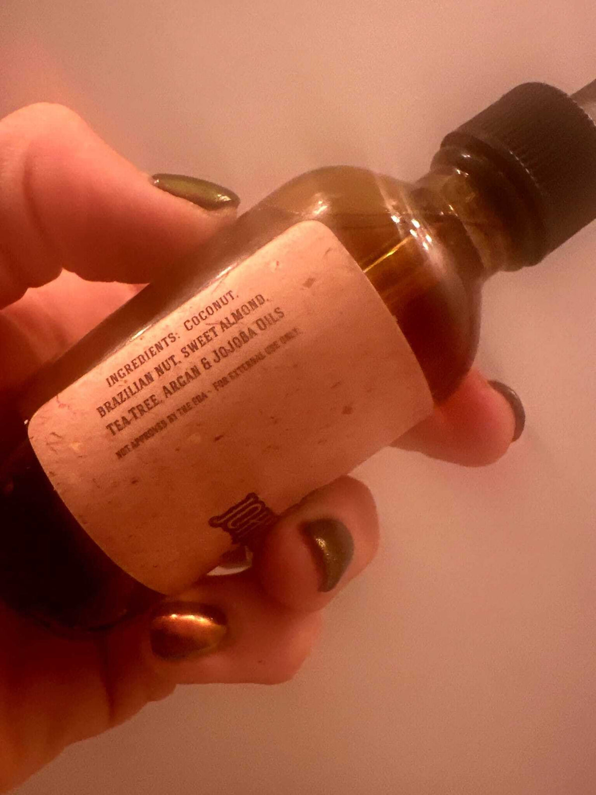 Johnny Slicks bottle staged in bathroom lifestyle setting conveying daily grooming routine benefit