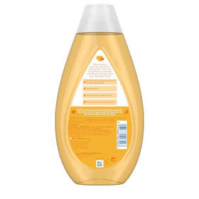 Johnson & Johnson shampoo pouring into palm creating soft foam for gentle cleanse