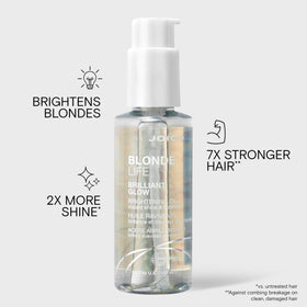 Applying Joico oil from hand to hair for smoothness benefit