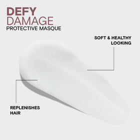 Joico applying masque to mid-lengths and ends, demonstrates repair process
