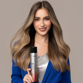 Joico Heat Hero held in hand for scale, highlights convenient 145g size