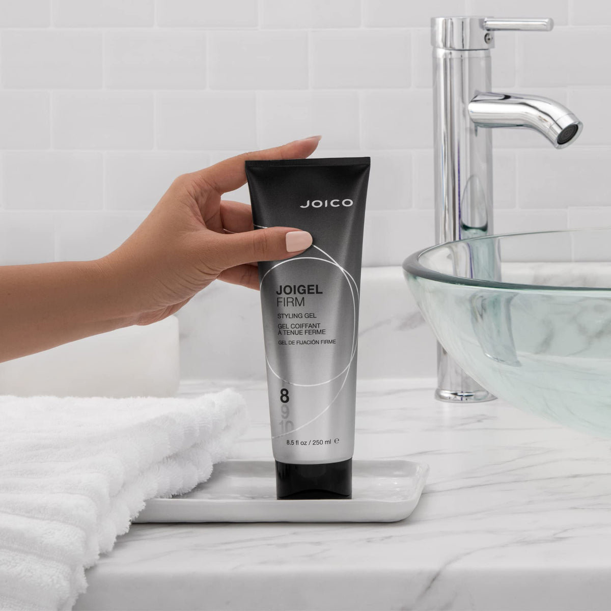 Joico JoiGel Firm used during blow-dry showing added volume and styling control