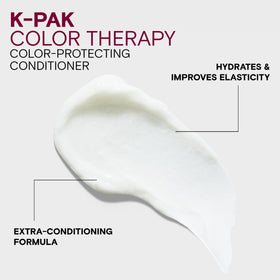 Joico K-PAK bottle in hand showing 8.5 fl oz scale and travel convenience