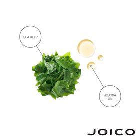 Joico shampoo bottle in hand indicating generous size and easy dispensing for home use