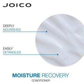 Joico size comparison with hands demonstrating bottle dimensions