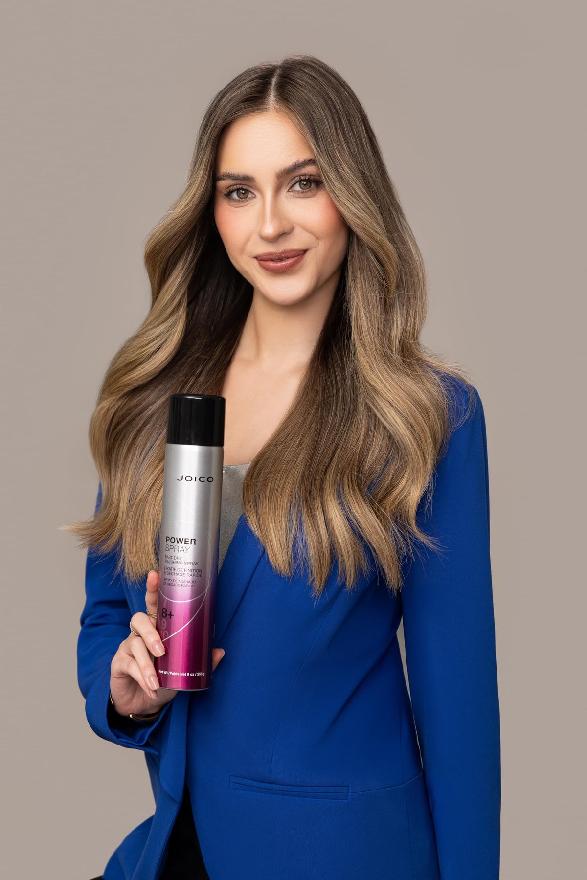 Joico bottle next to ruler showing 9.0 fl oz size benefit