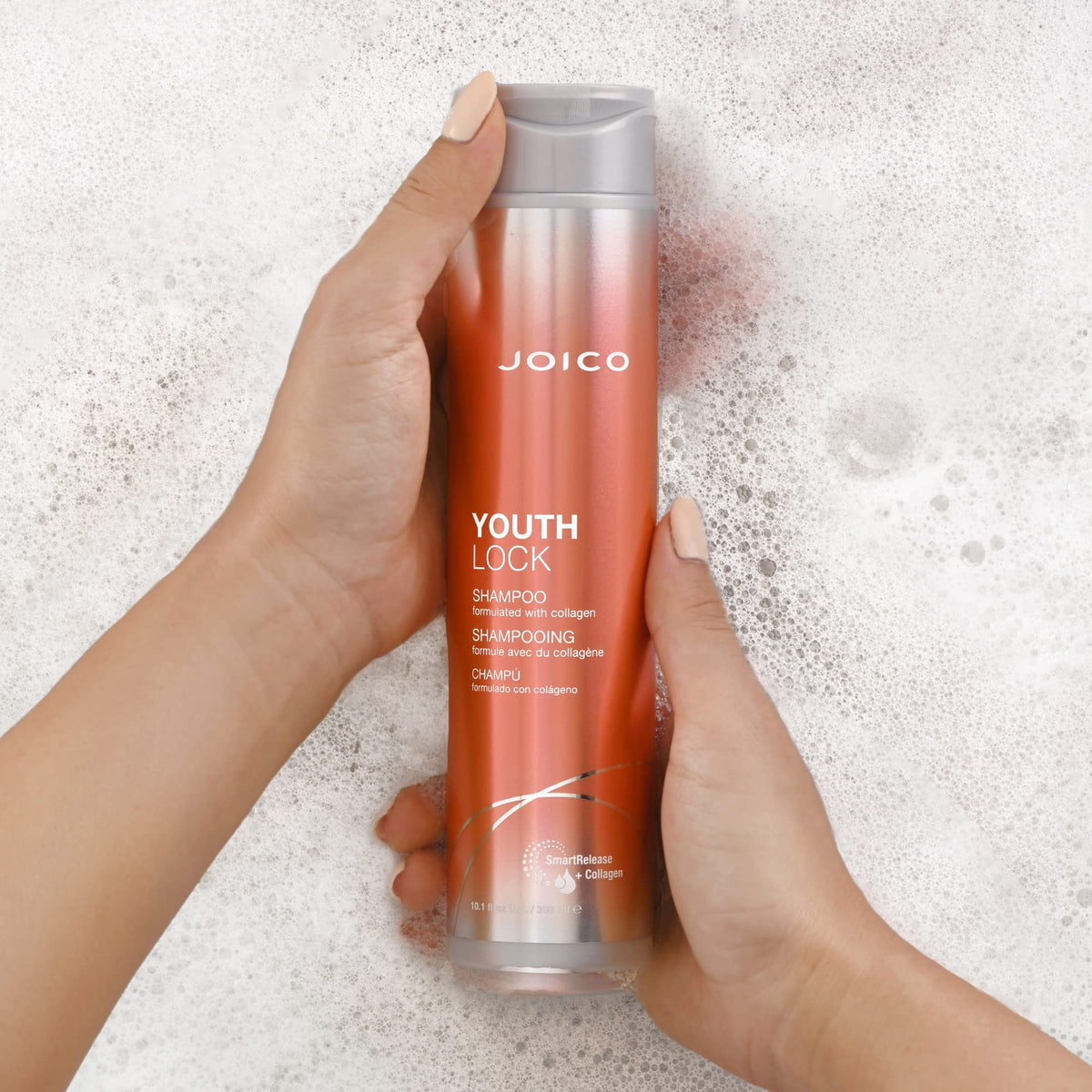 Joico YouthLock shampoo in bathroom lifestyle scene suggesting daily routine benefit