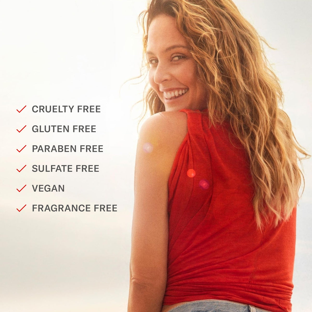 Josie Maran model with sun-kissed glow lifestyle image showing natural-looking radiance benefit