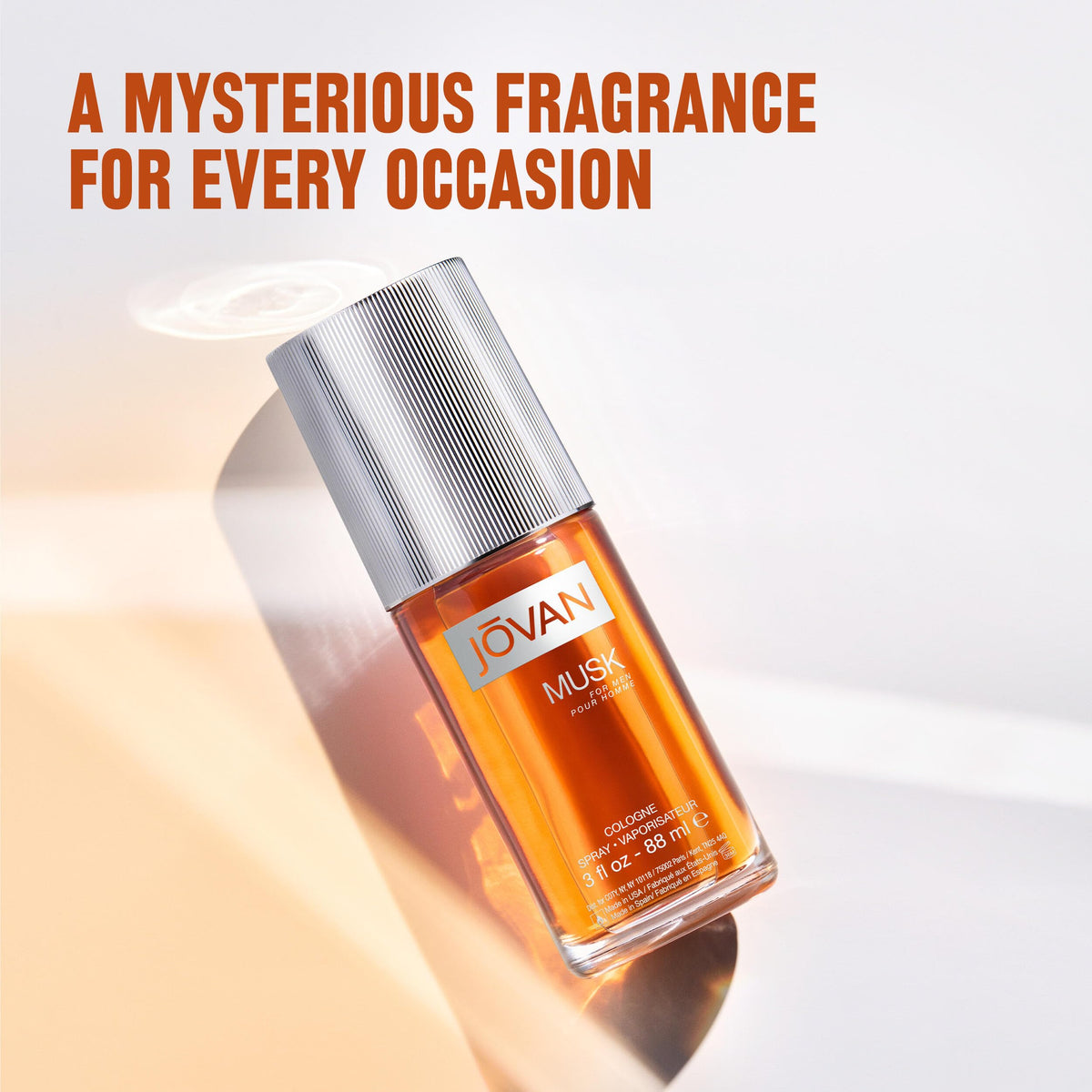 Jovan spray action from bottle demonstrating easy application benefit