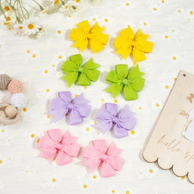 JOYOYO assorted bows styled in toddler outfit, ready for events