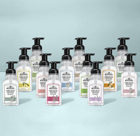 J.R. Watkins bottle size comparison in hand showing travel-friendly benefit