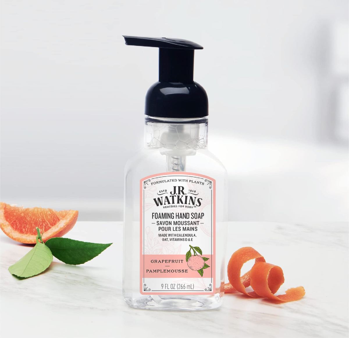 J.R. Watkins bottle by kitchen sink illustrating everyday household use and freshness
