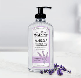 J.R. Watkins three bottles arranged at a kitchen sink conveying consistent scent and convenience