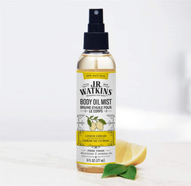 J.R. Watkins bottle in a hand to show 6 fl oz size and portable benefit