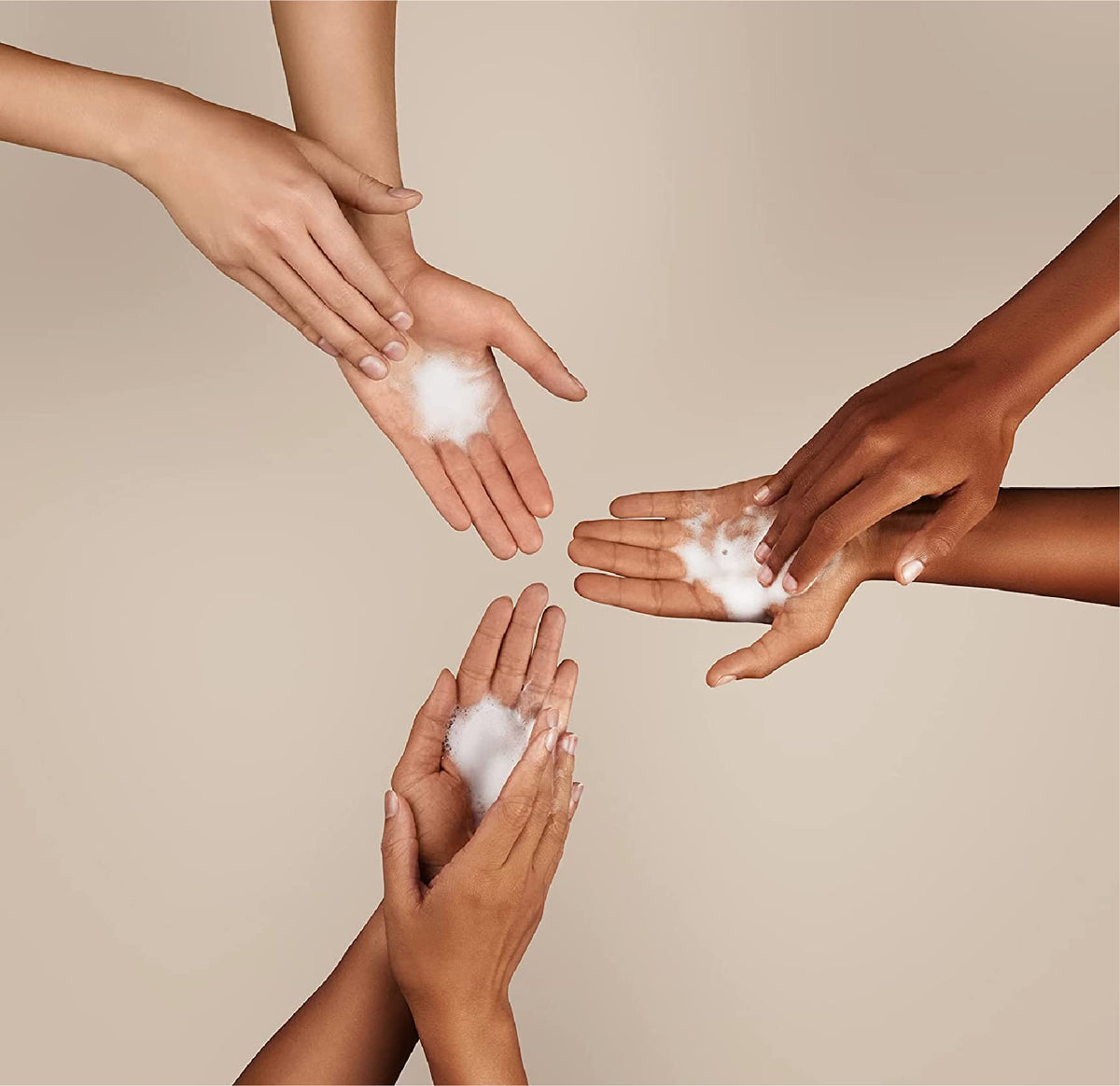 J.R. Watkins foam texture on hand demonstrating gentle lather and moisturizing feel