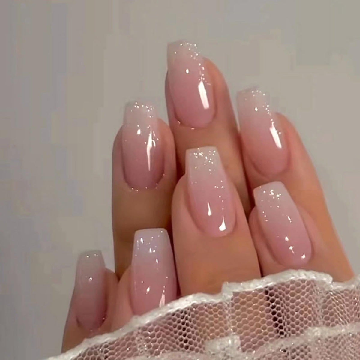 Jsiallye close detail of pink gradient finish highlighting smooth ombré look