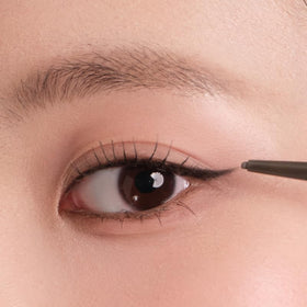 JUDYDOLL gel pencil swatch on skin showing smooth, pigment-rich texture