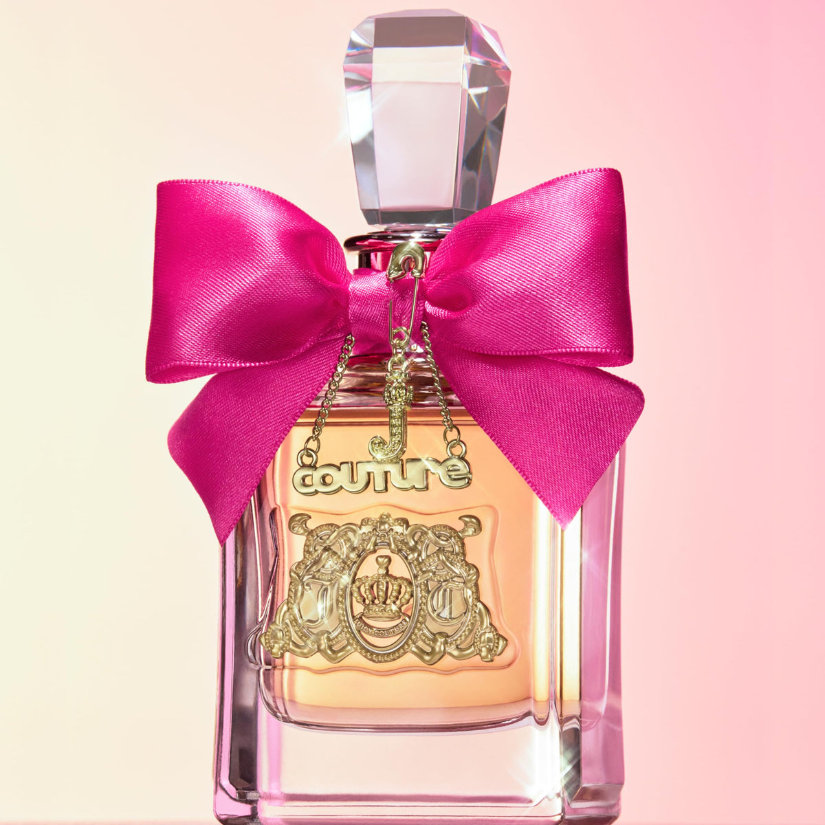 Mandarin and gardenia visual representing Juicy Couture scent's fresh floral notes
