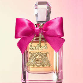 Juicy Couture golden liquid close-up conveying warm caramel richness