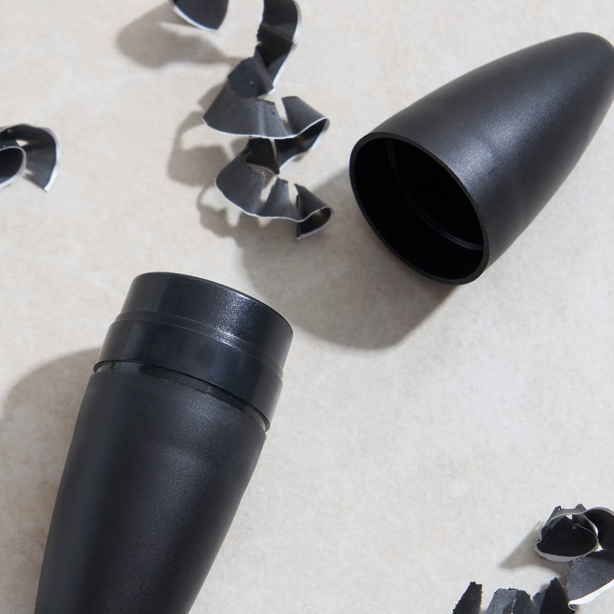 Julep cleaning pick next to sharpener illustrating easy maintenance