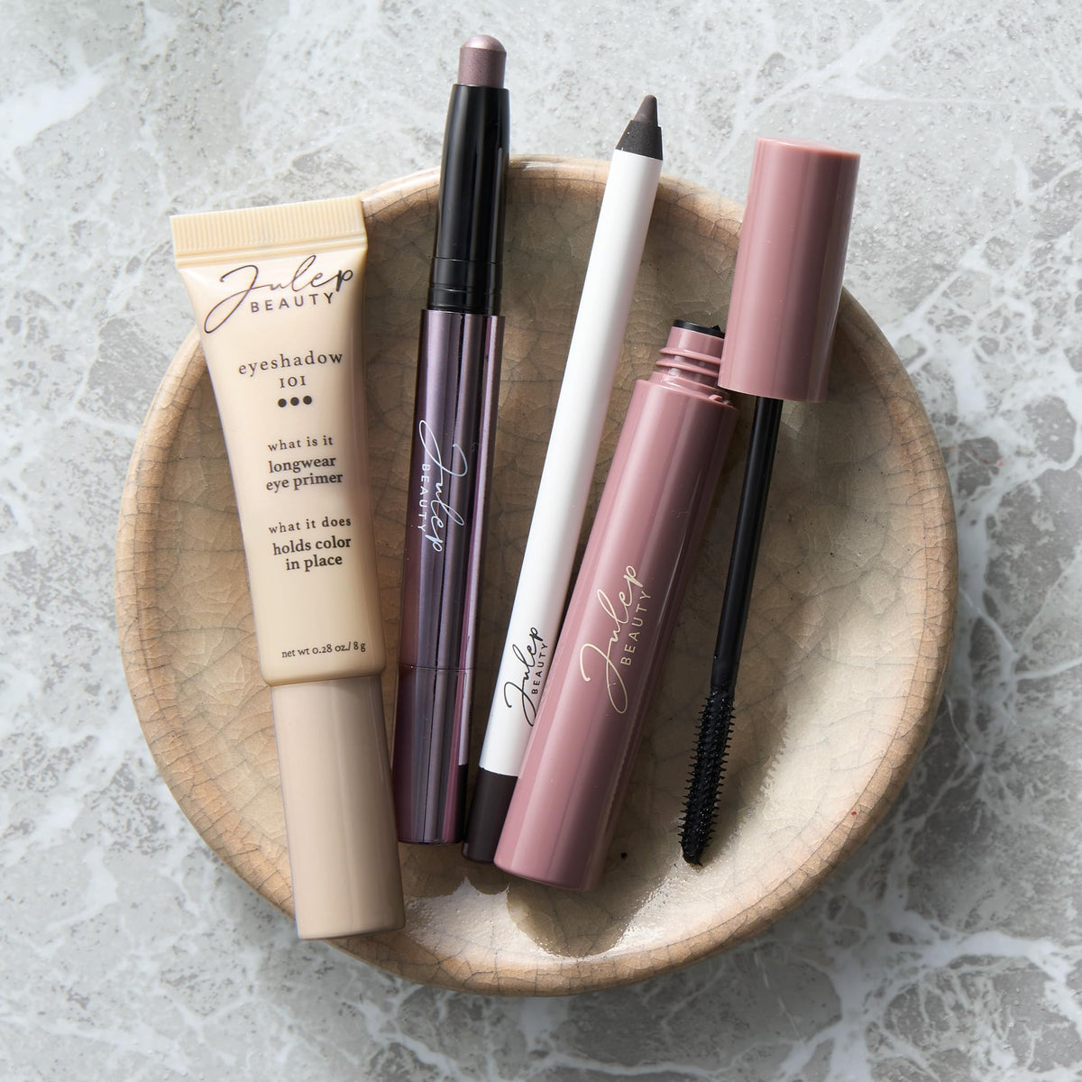 Julep in a styled makeup bag scene demonstrating everyday usability and style