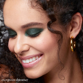 Julep applied on eye close-up showing crease-proof shimmer and defined color