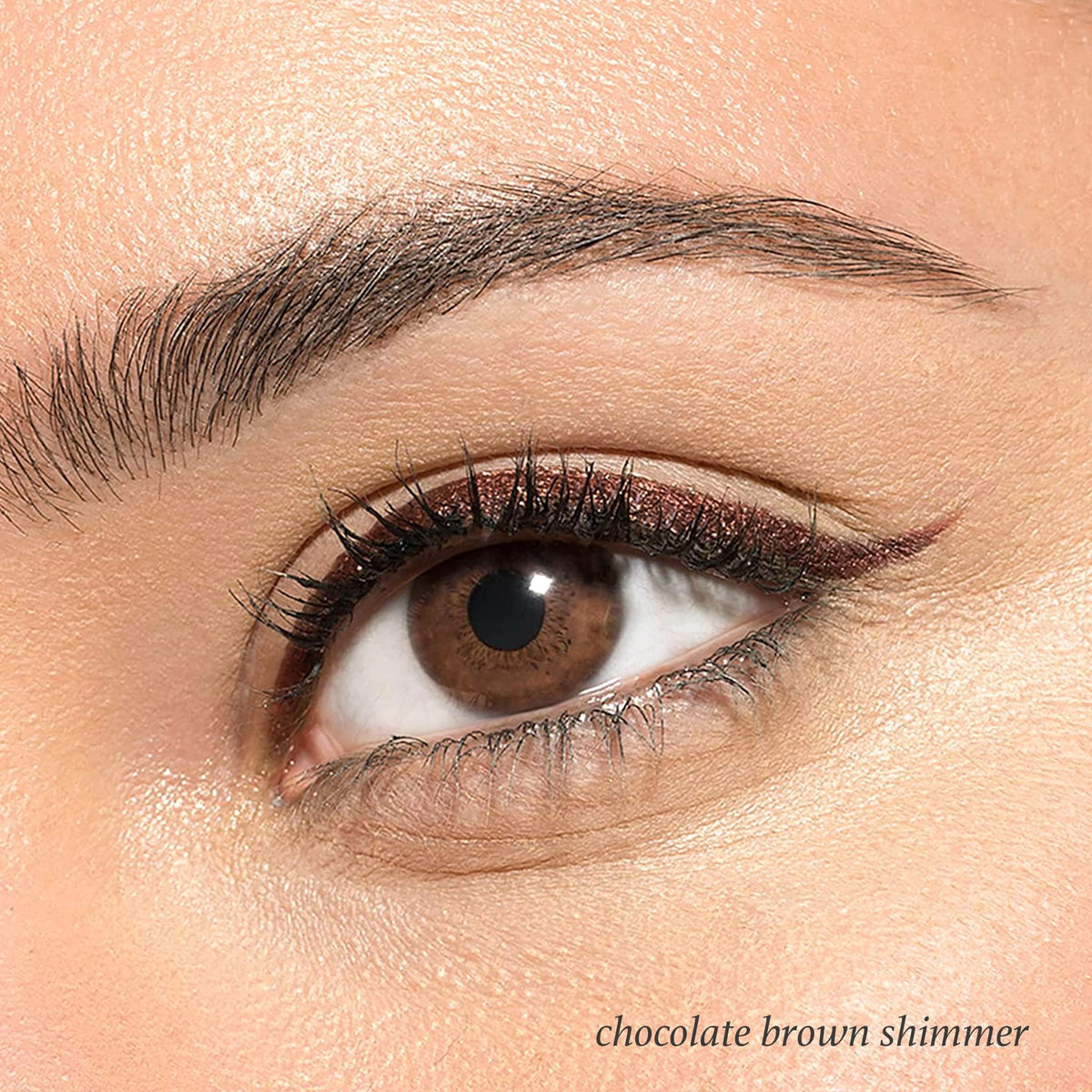 Julep product stroke on skin showing creamy texture and buildable shimmer payoff