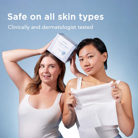 Just Clean Skin towel held in hand to show XL size and coverage
