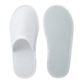 Juvale slippers placed on bedside table to enhance guest comfort and presentation