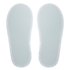 Juvale slippers styled with spa towels creating a professional, welcoming atmosphere