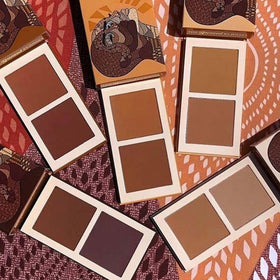 Juvia's Place bronzer on vanity with mirrors and decor showing everyday use benefit polished look
