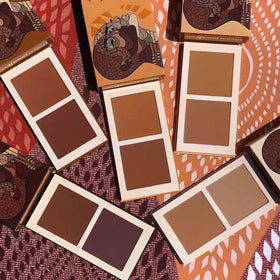 Juvia's Place brush applying bronzer demonstrating precise sculpting benefit