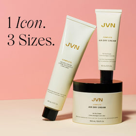 JVN cream in hand being applied to hair demonstrating soft, touchable hold