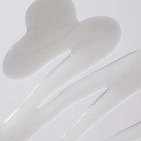 JVN Embody shampoo rinsing in shower demonstrating buildup removal benefit