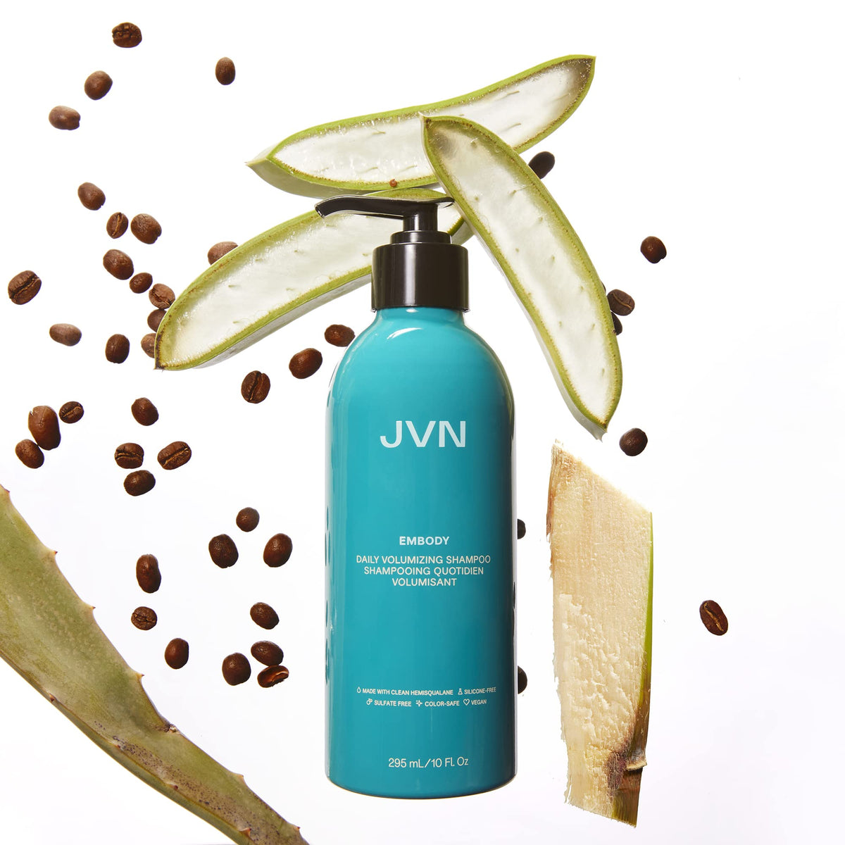 JVN Embody bottle in hand for scale showing 10 fl oz travel-friendly size