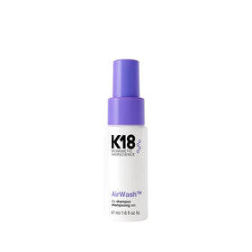 K18 AirWash travel bottle front view showing compact packaging and fresh benefit