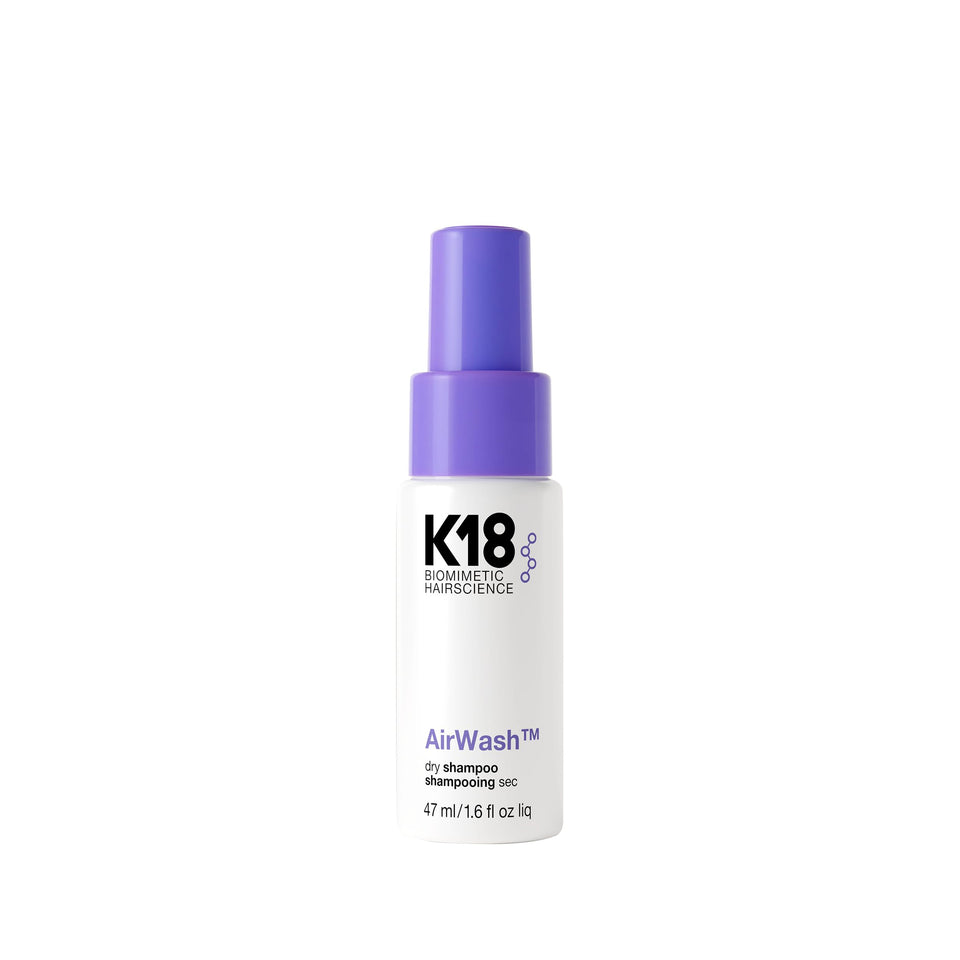 K18 AirWash travel bottle front view showing compact packaging and fresh benefit